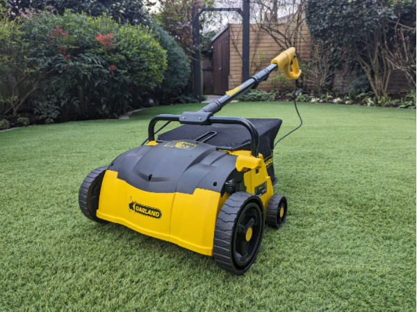 302E electric lawn sweeper in use on synthetic grass Australia